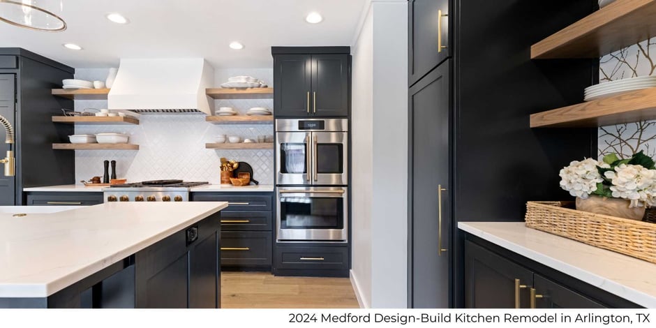 Kitchen remodel with black cabinetry and gold features in Arlington, TX by Medford Design-Build