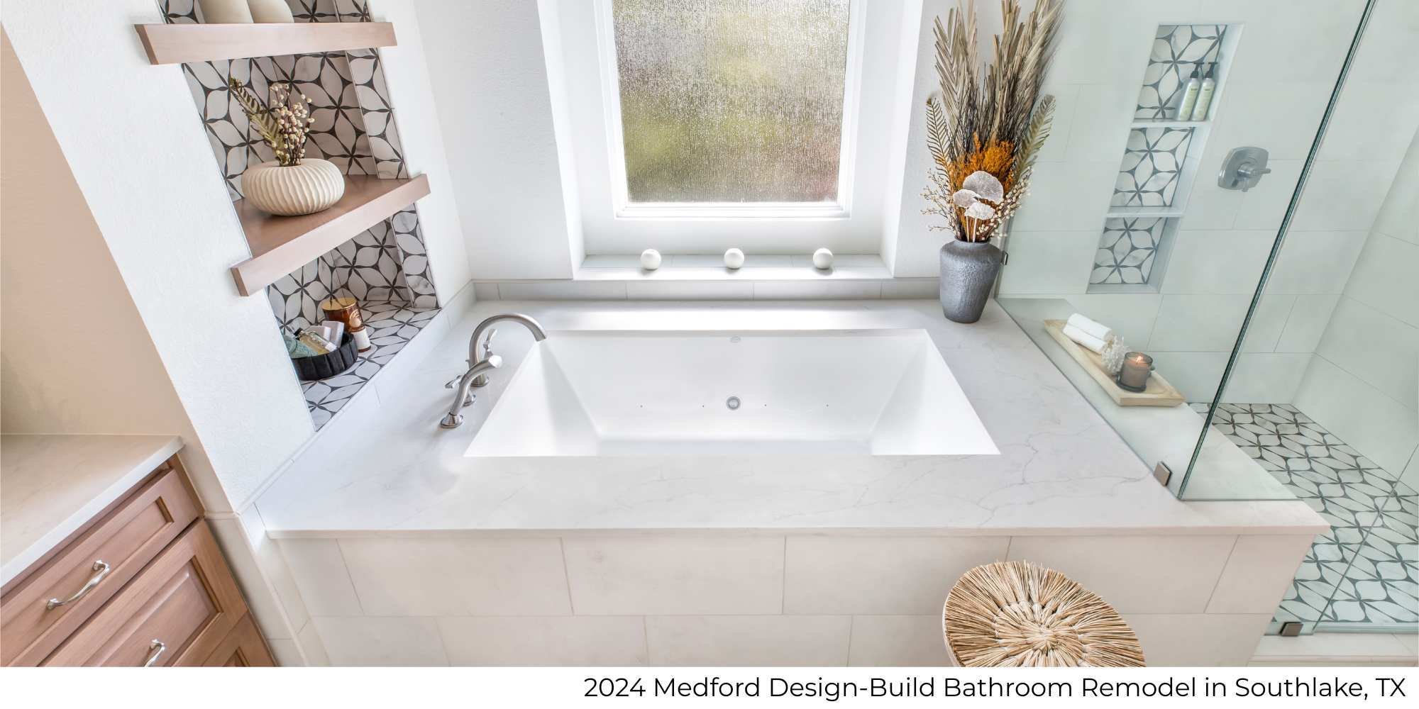 Image of a soaking tub beside a walk-in shower and built-in shelving by Medford Design-Build in Southlake, TX