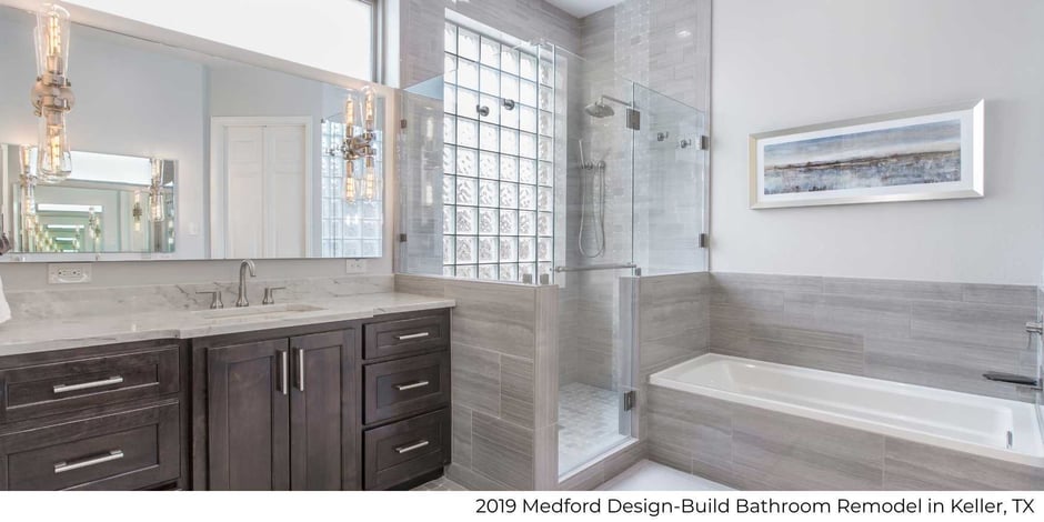 Photo of bathroom remodel with dual vanity, glass shower, and tub by Medford Design-Build in Keller, TX