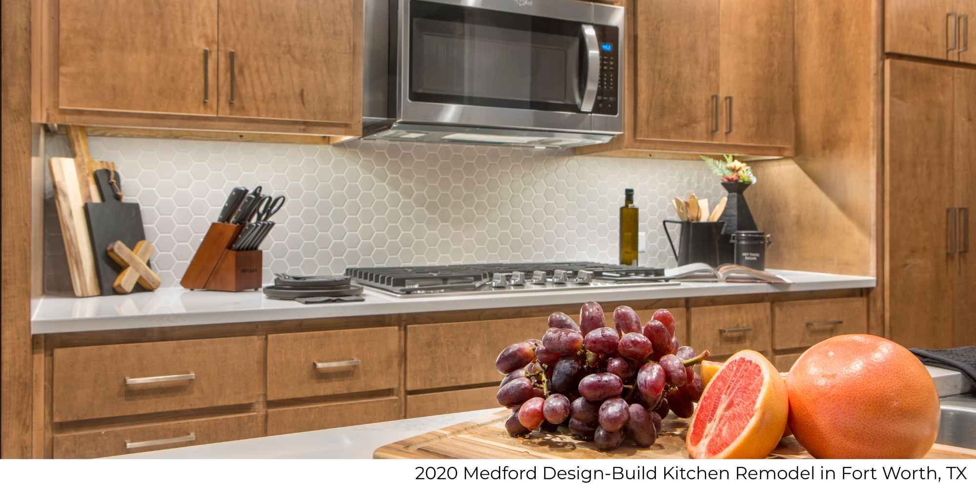 Image of a kitchen remodel with under-counter lighting, on-counter stovetop by Medford Design-Build in Fort Worth, TX