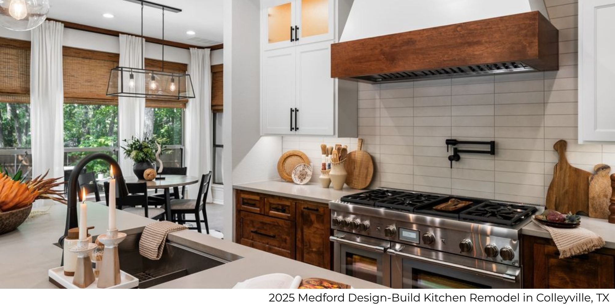Kitchen remodel featuring dark wood accents, a large gas range and oven, and white cabinetry in Colleyville, TX by Medford Design-Build
