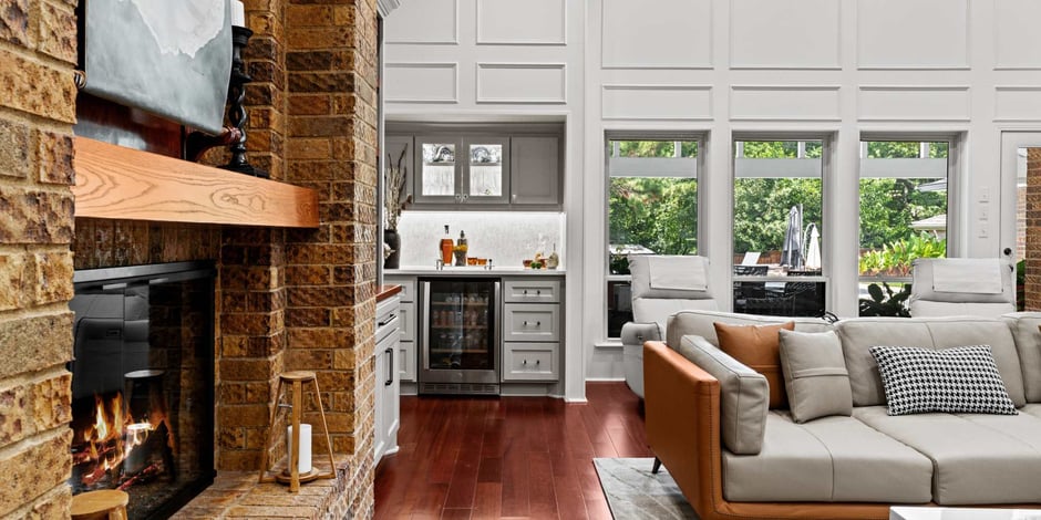 Living remodel with fireplace and drink station by Medford Design-Build in Arlington, TX