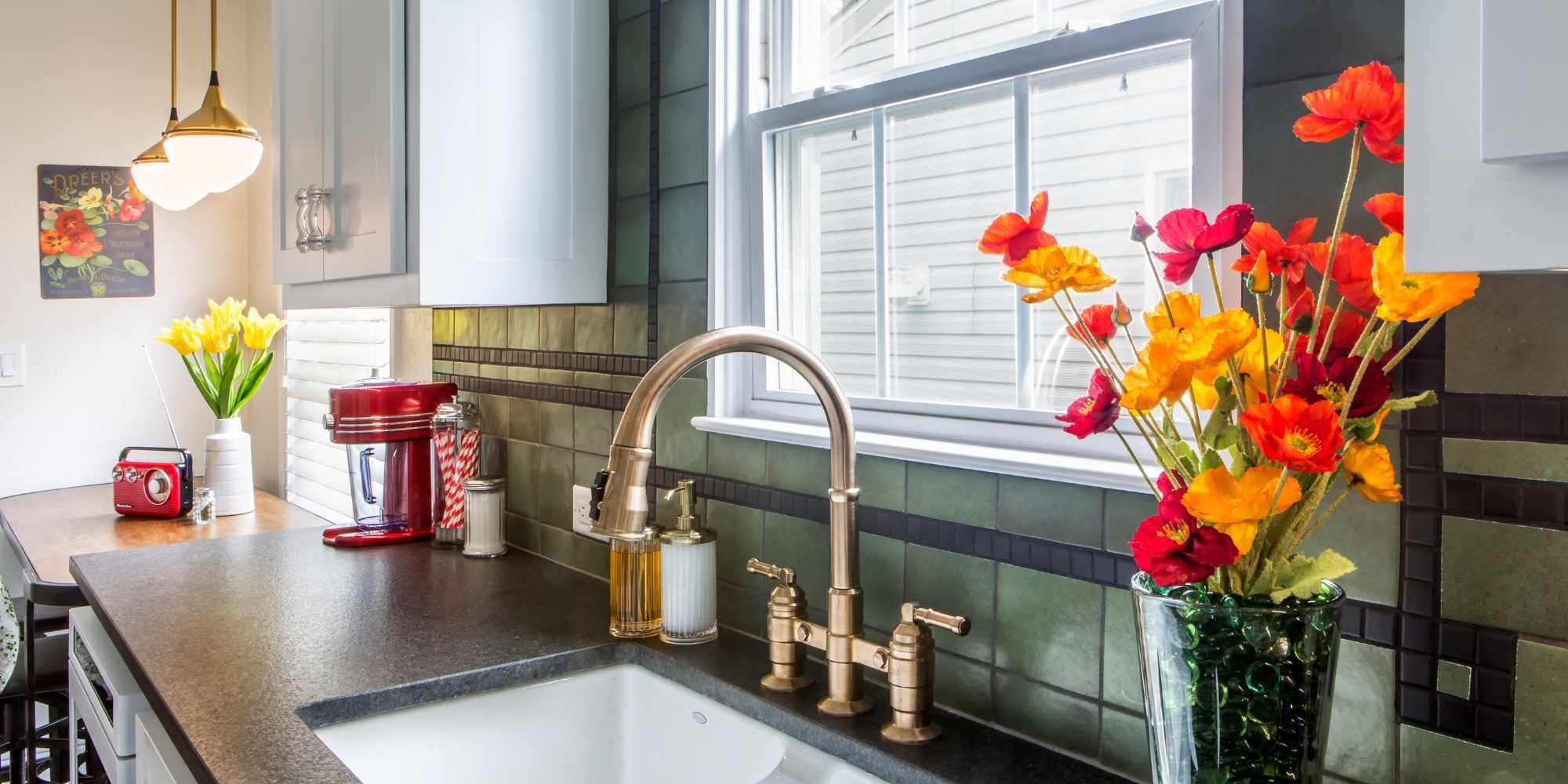 Sink with tile backsplash in a kitchen remodel by Medford Design-Build in Arlington, TX