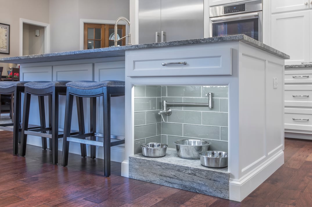 Kitchen island with custom built-in doggie station.