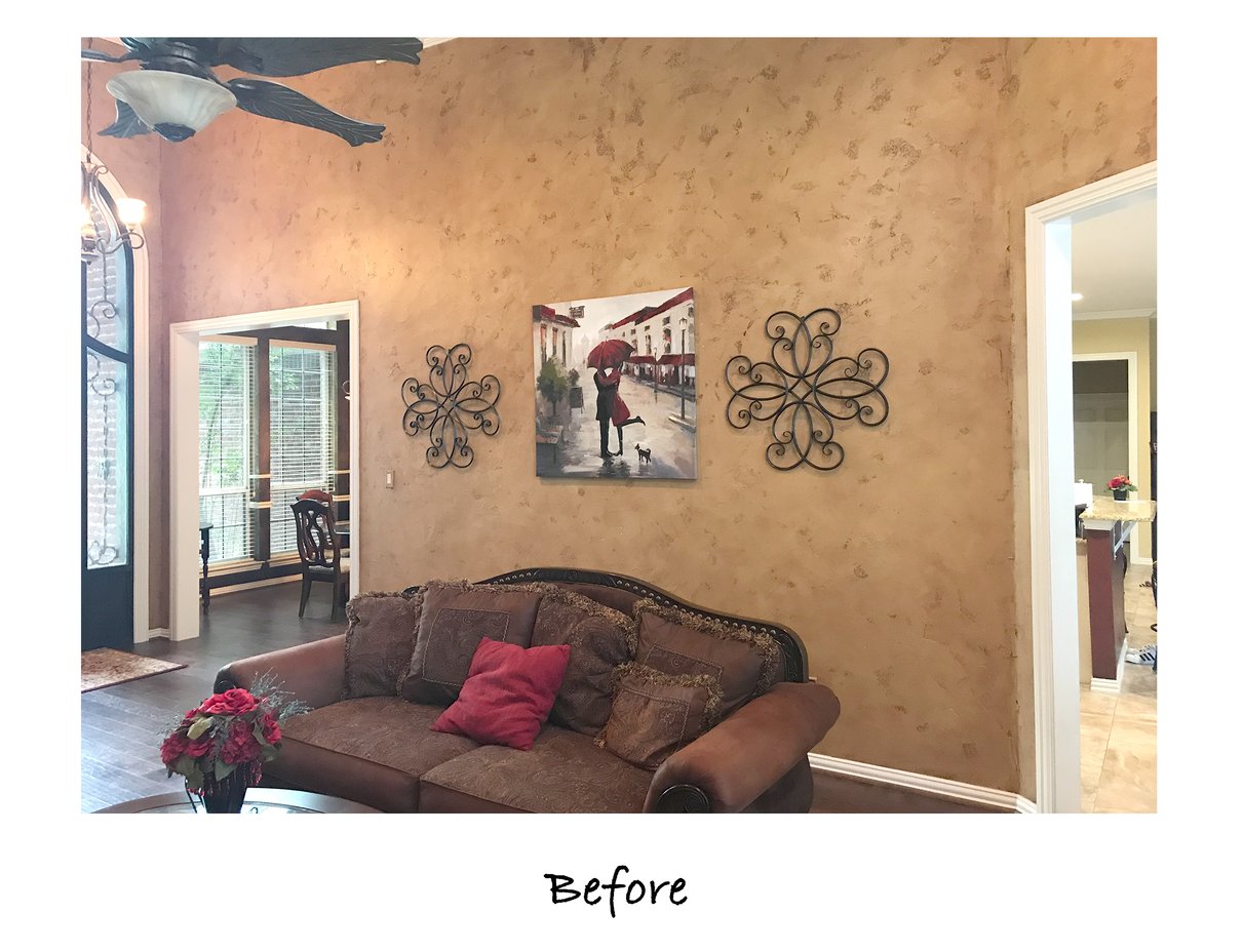 Living room before wall removal to create an open-concept floor plan.