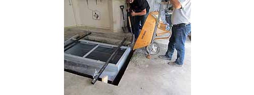 pouring concrete around tornado shelter