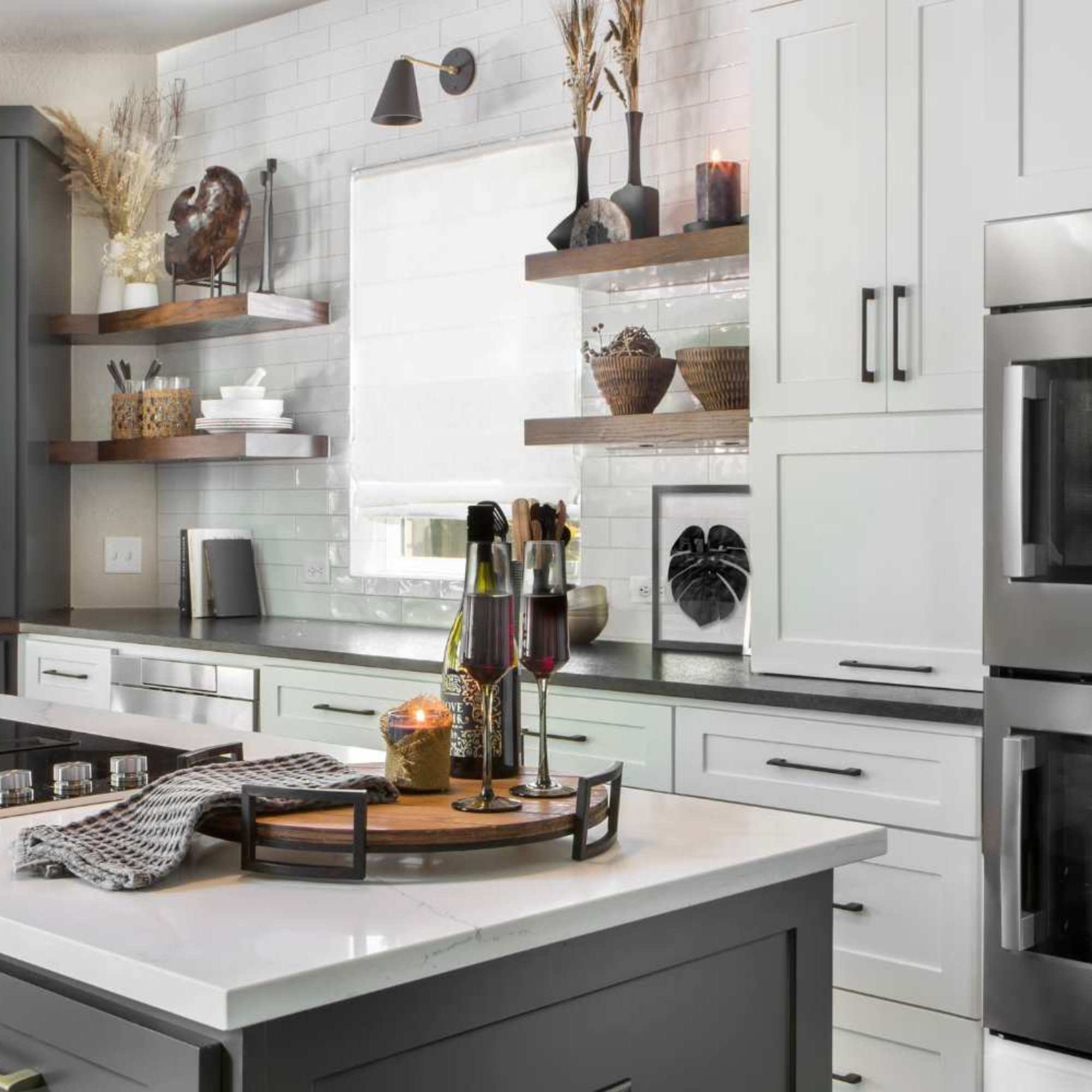 Kitchen remodel with built-in ovens and island stovetop by Medford Design-Build in Colleyville, TX