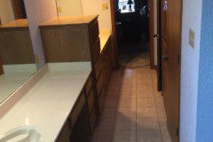 BEFORE: Here is another shot of the vanity and cabinets before the renovation.