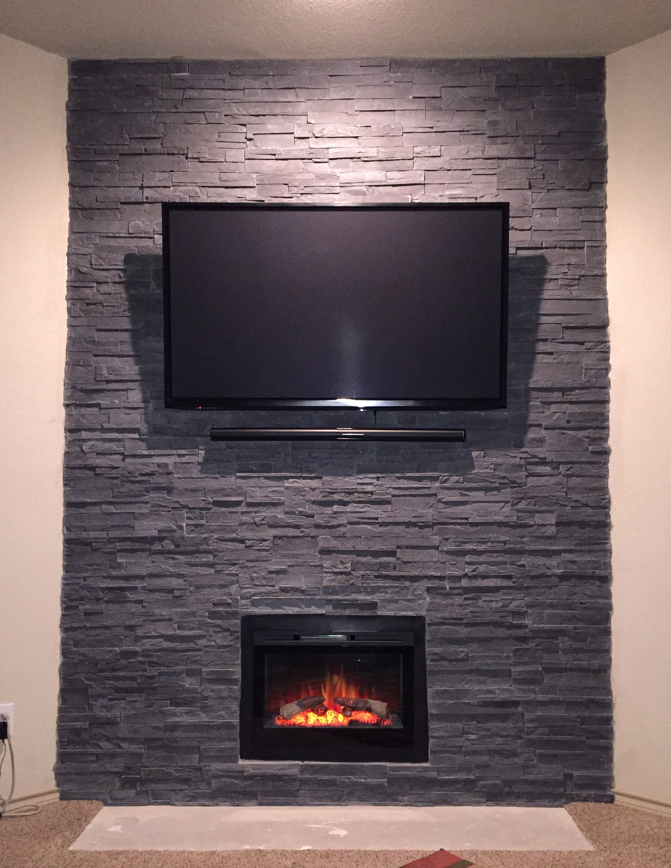 From Dull to Dramatic: Fireplace Transformed with Cultured Stone