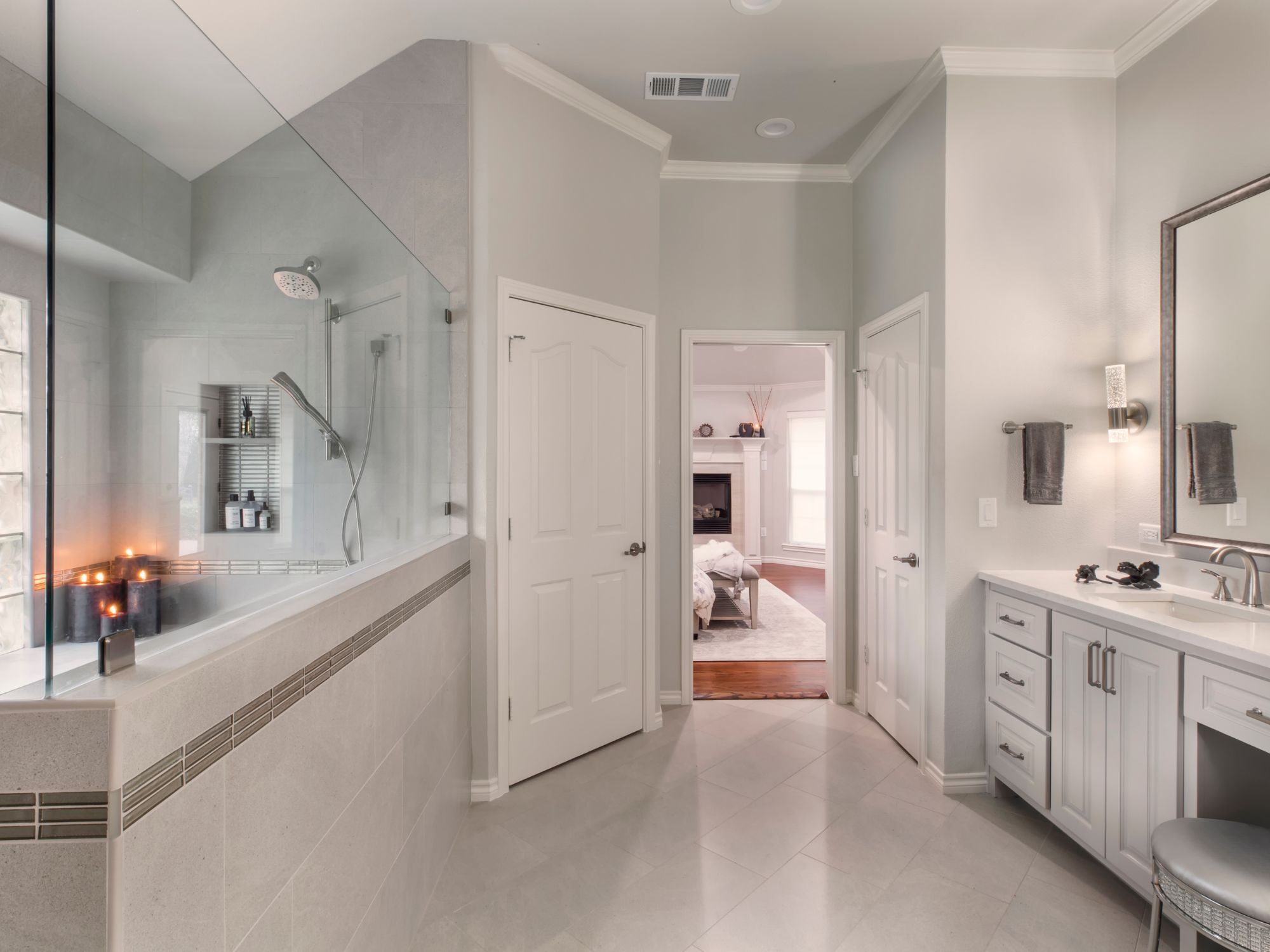 Bathroom remodel in Colleyville, TX with an oversized shower, tile floor, and custom vanity by Medford Design-Build Bathroom remodel in Colleyville, TX with an oversized shower, tile floor, and custom vanity by Medford Design-Build