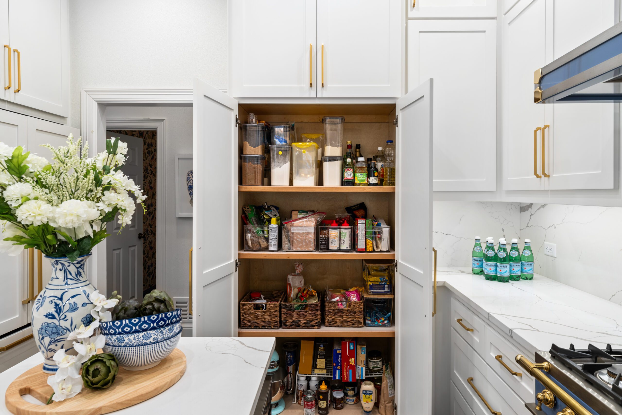 Concealed Pantry Behind Cabinet-Matching Doors